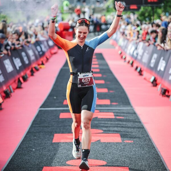 IRONMAN athlete running in hot conditions — heat management strategy for triathlon