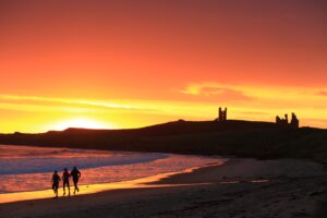 Age-group triathlete training early morning in Northumberland, illustrating how sleep and life commitments affect triathlon training